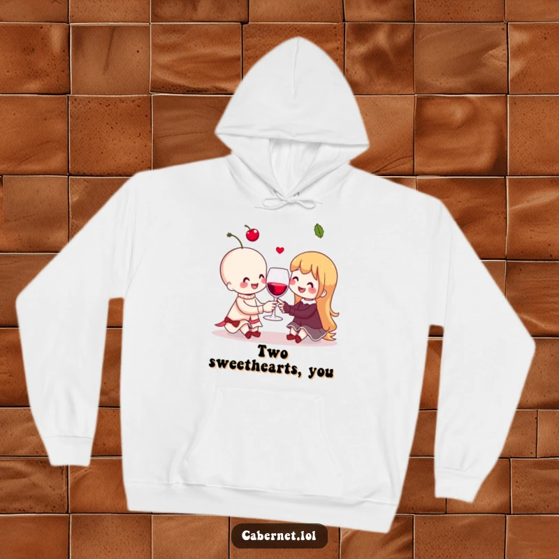Funny cheerful cherry couple sharing a tiny invisible wine glass, depicted on a cozy hoodie for a heartwarming funny gift.